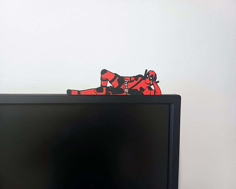 Deadpool on monitor with stand