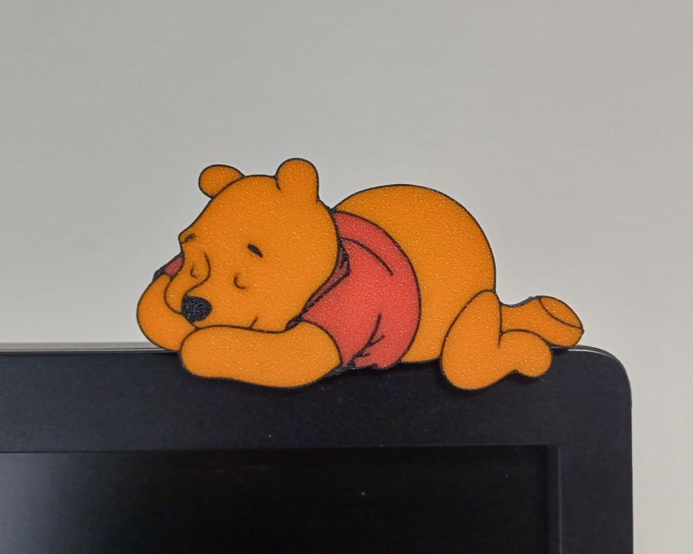 Pooh on monitor with stand