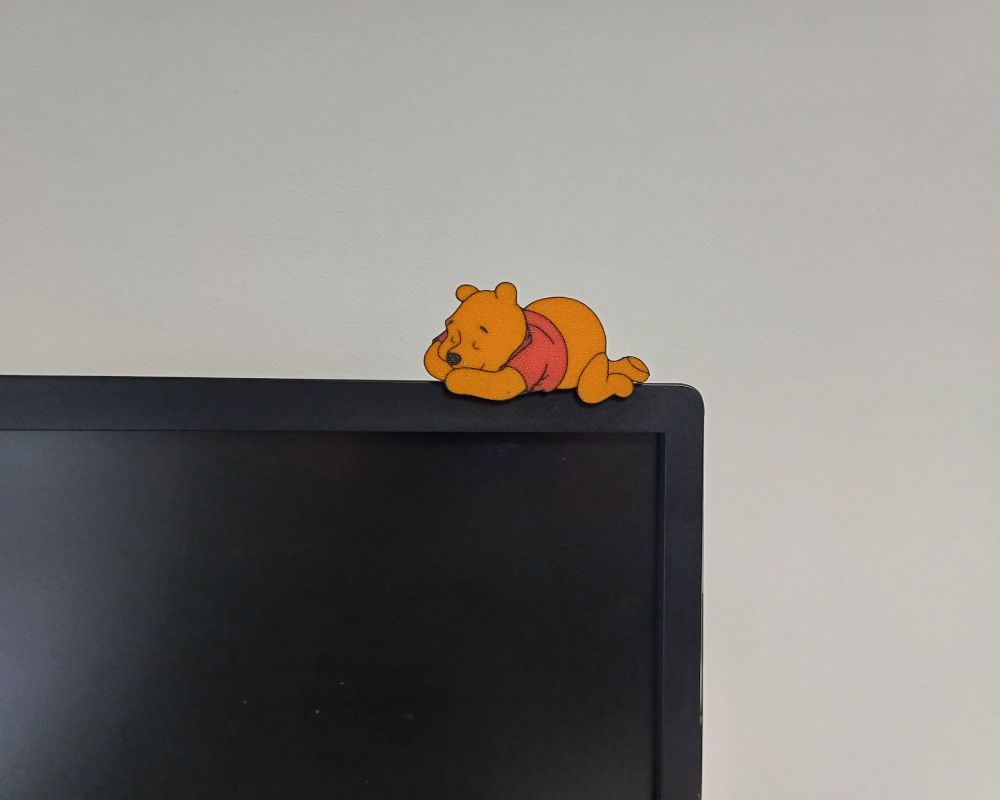 Pooh on monitor with stand