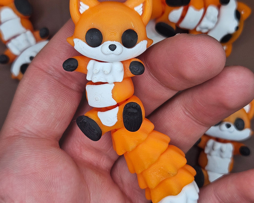 Moxxie – Flexi Fox Keychain & Fridge Magnet