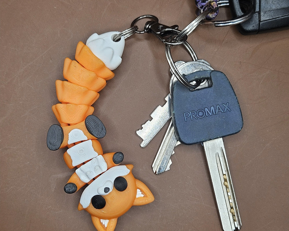 Moxxie – Flexi Fox Keychain & Fridge Magnet