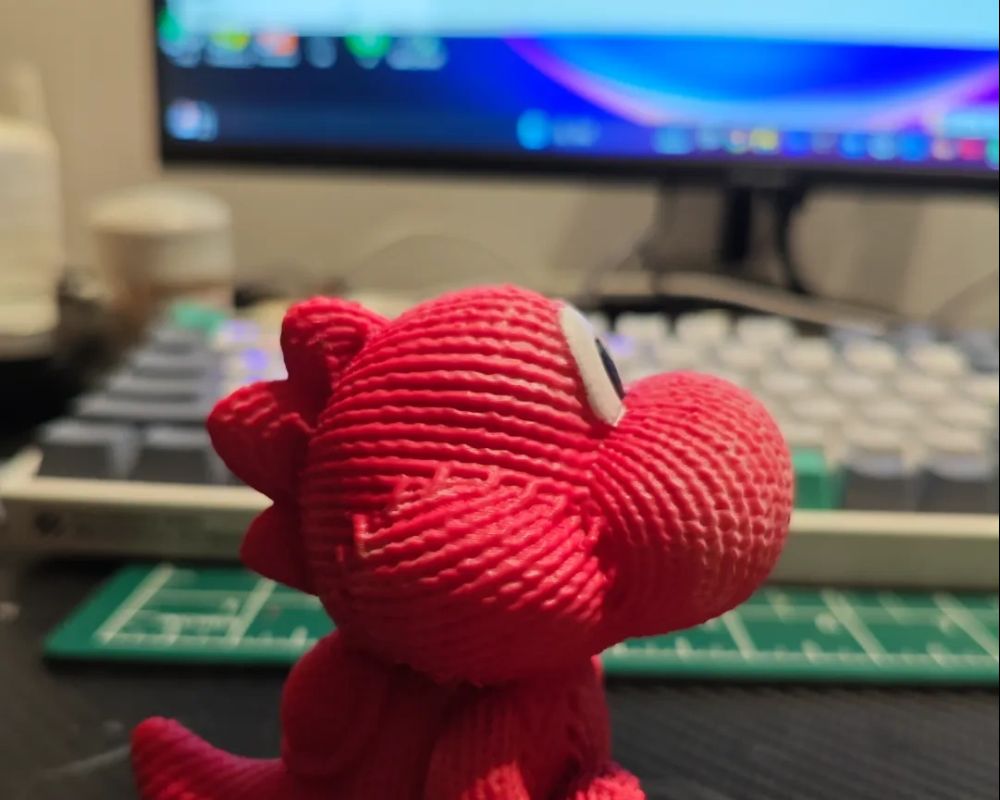 Super cute knitted Yoshi dinosaur