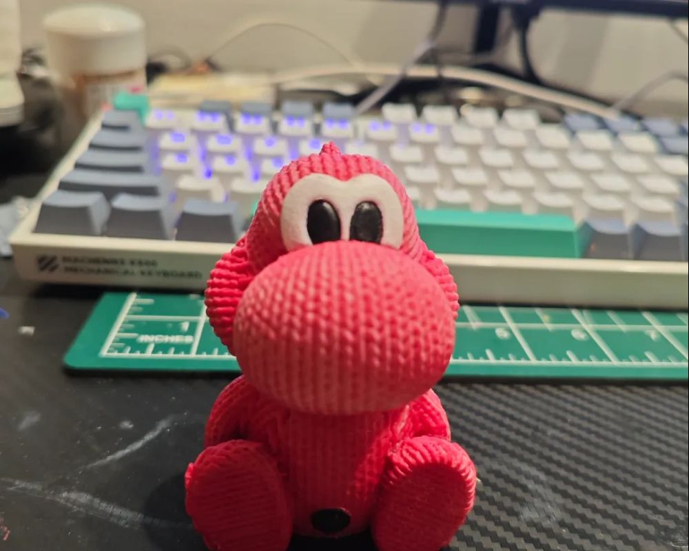 Super cute knitted Yoshi dinosaur