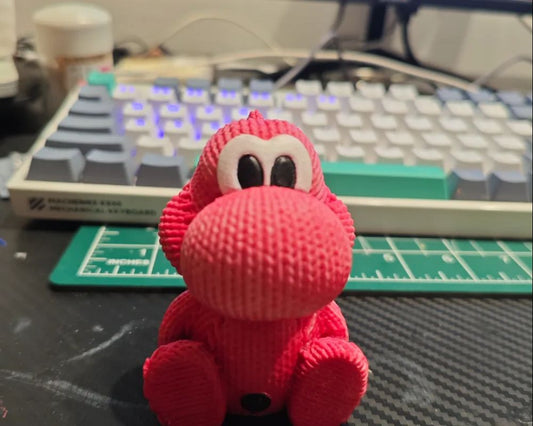 Super cute knitted Yoshi dinosaur