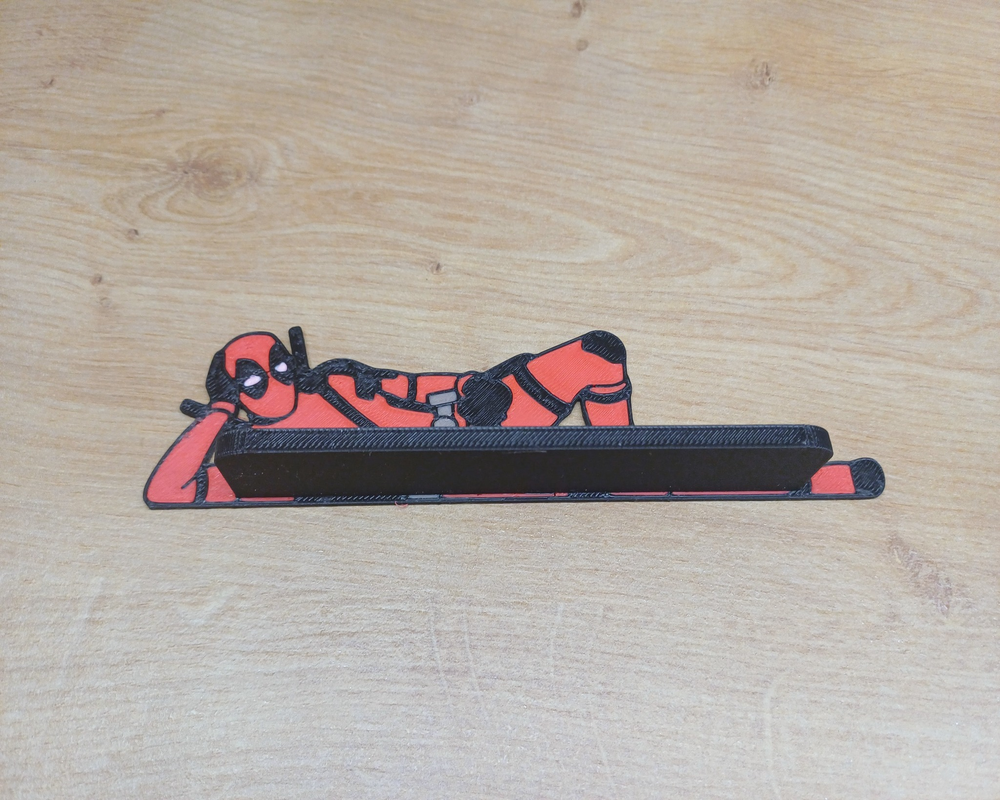 Deadpool on monitor with stand