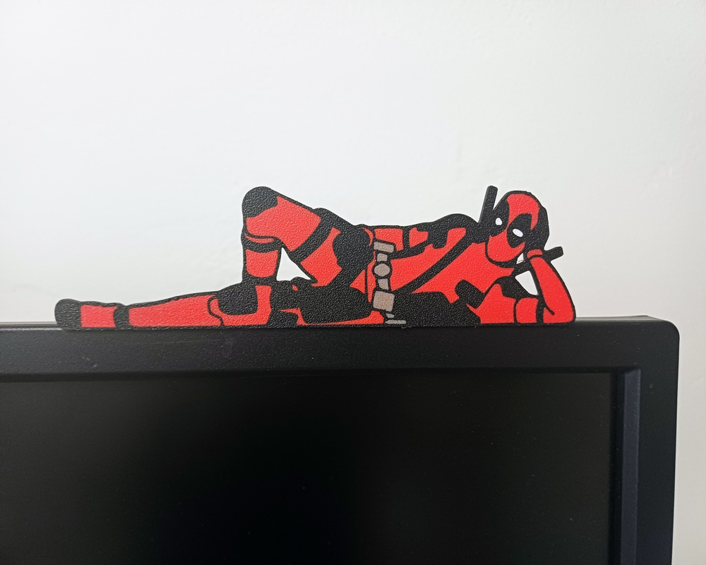 Deadpool on monitor with stand